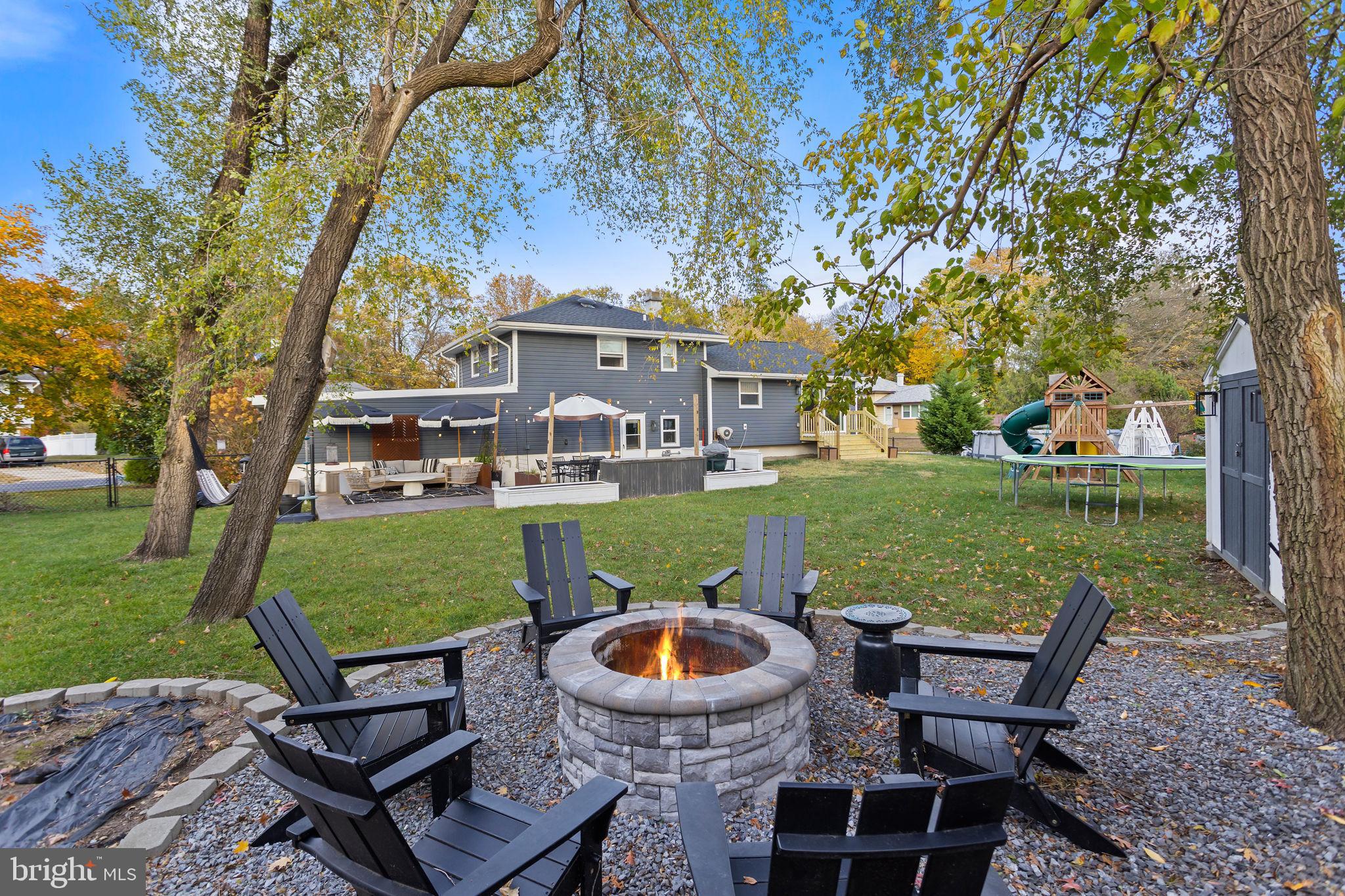 2 Spruce Road Burlington, NJ 08016 - Photo 28 of 34 a view of a house with backyard sitting area and garden