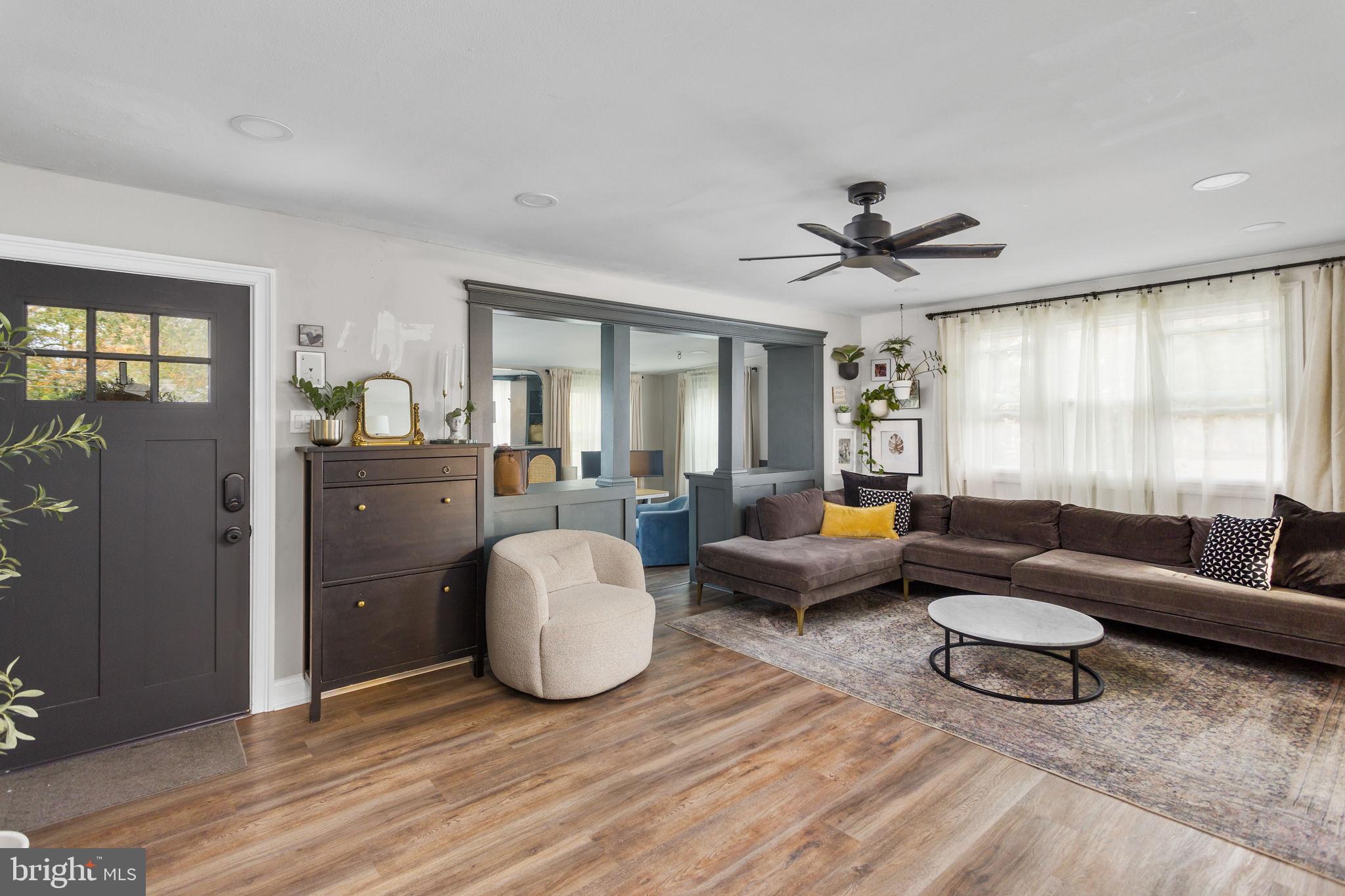 2 Spruce Road Burlington, NJ 08016 - Photo 4 of 34 a living room with furniture and a large window