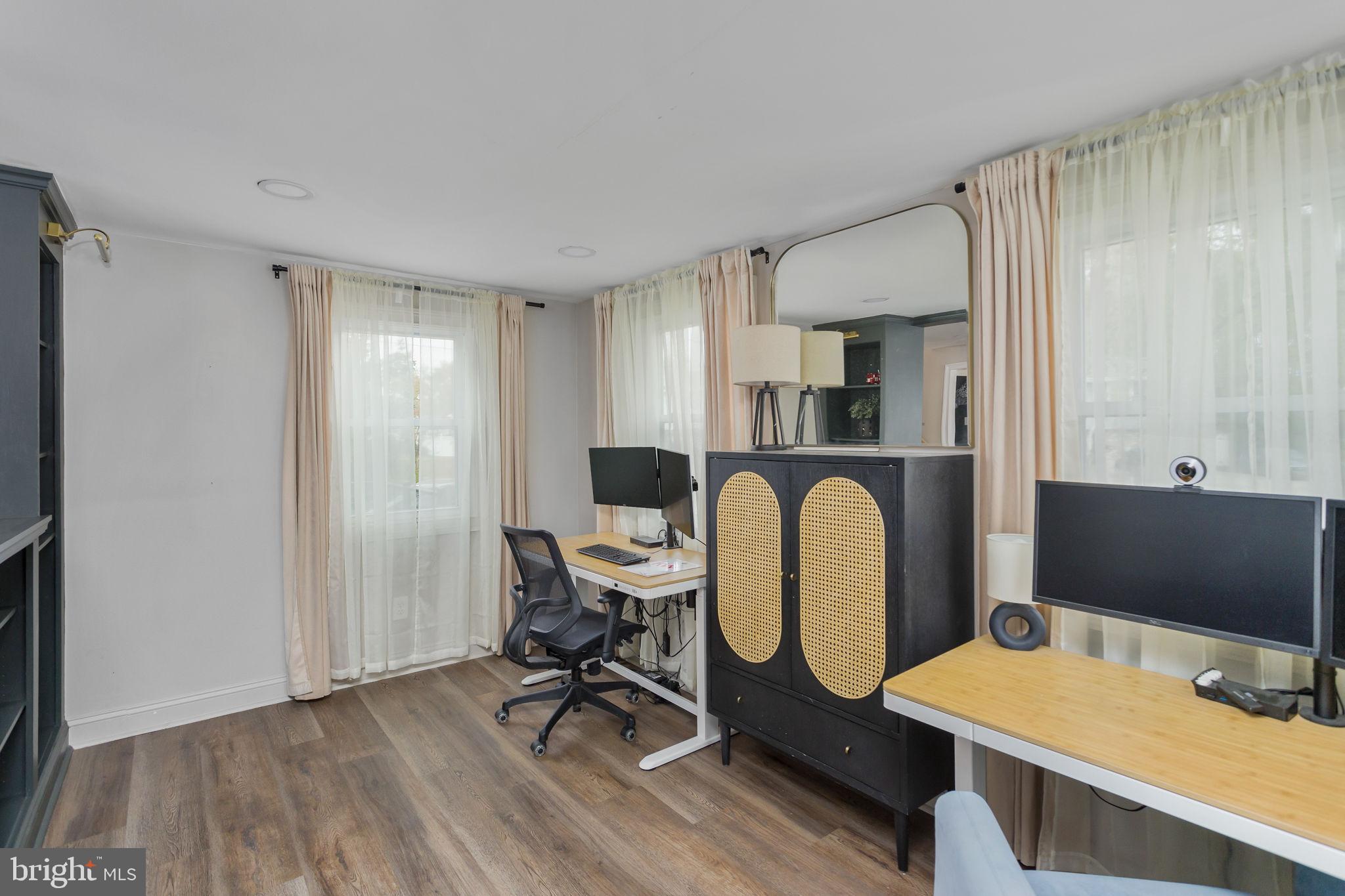 2 Spruce Road Burlington, NJ 08016 - Photo 8 of 34 a view of a workspace with furniture and a window