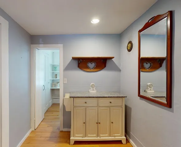 a kitchen with a sink and a cabinets