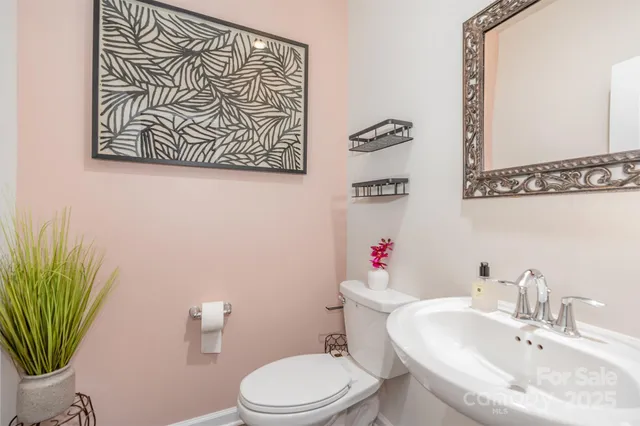 a bathroom with a toilet and a sink