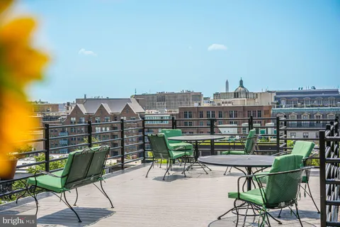 a view of a terrace with furniture