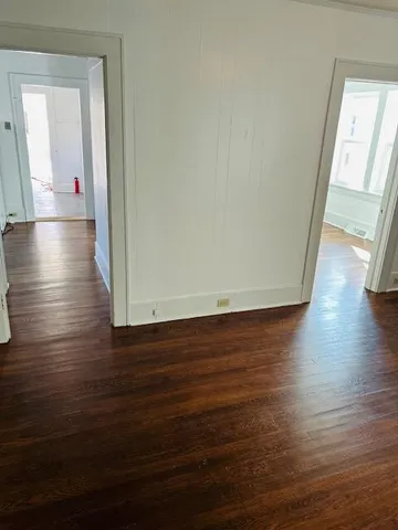a view of livingroom and hardwood floor