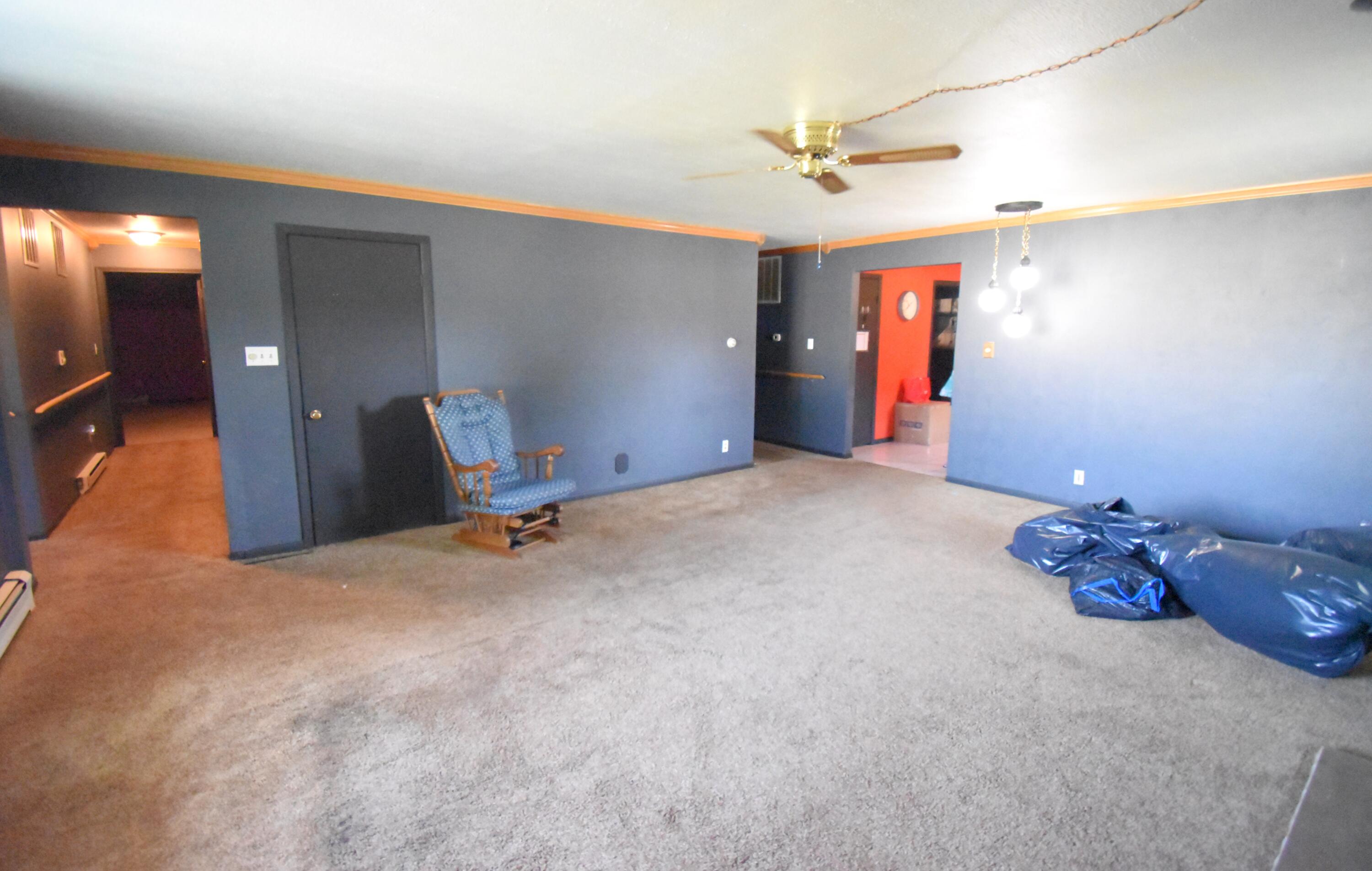 719 North Monroe Street Rensselaer, IN 47978 - Photo 12 of 41 a room with furniture and ceiling fan