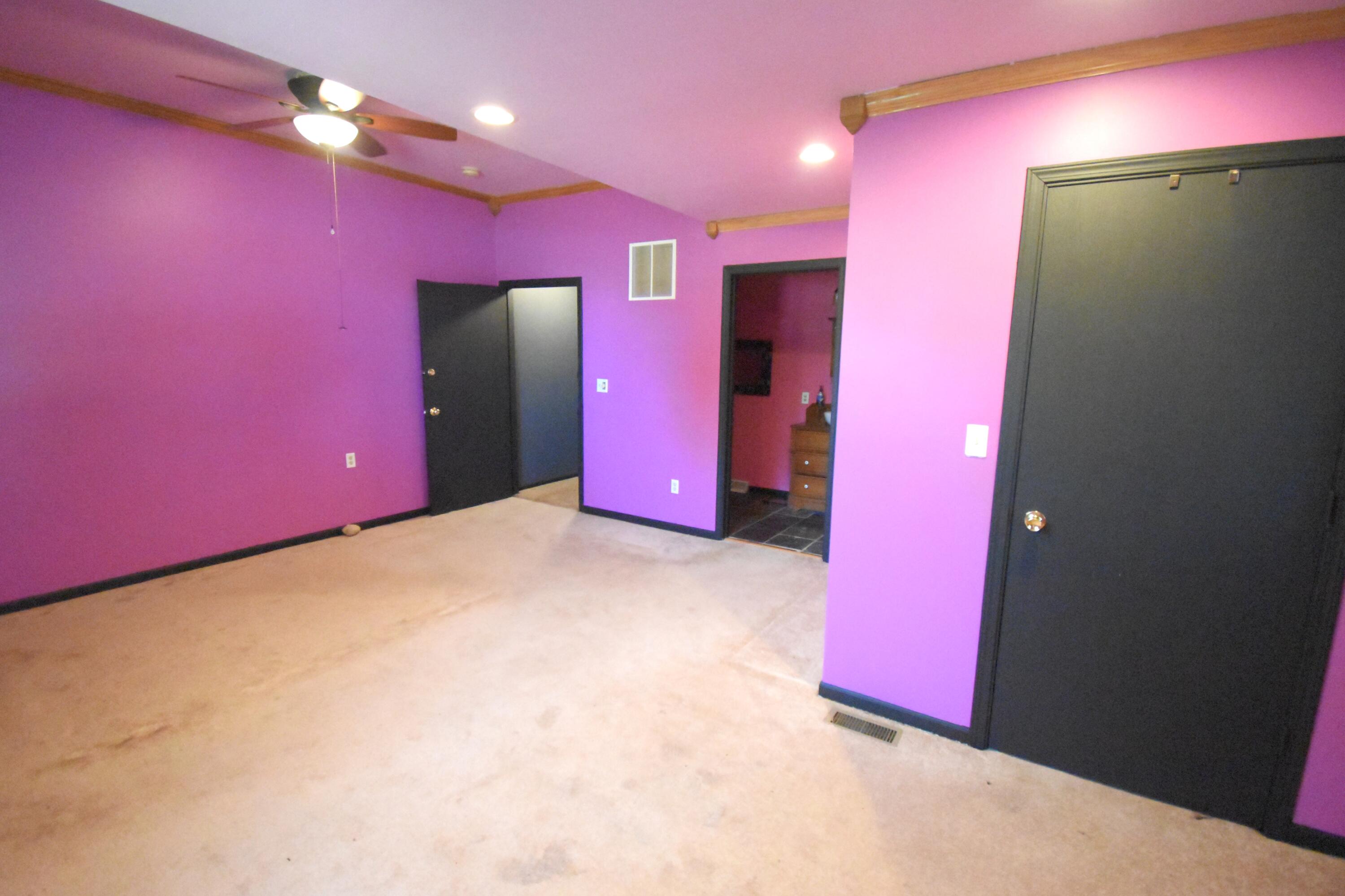 719 North Monroe Street Rensselaer, IN 47978 - Photo 23 of 41 a empty room with painted walls