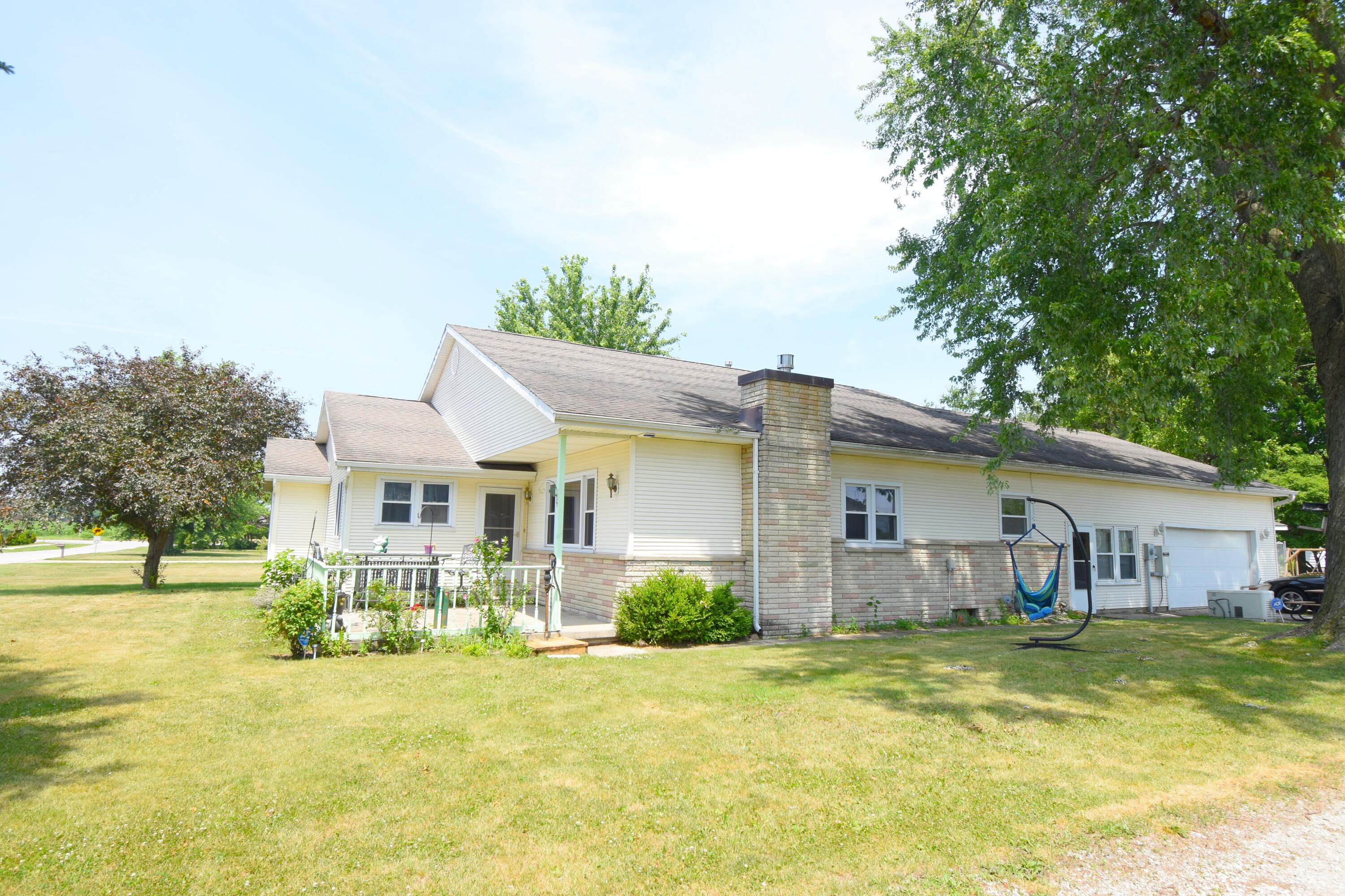719 North Monroe Street Rensselaer, IN 47978 - Photo 4 of 41 a front view of house with yard and swimming pool