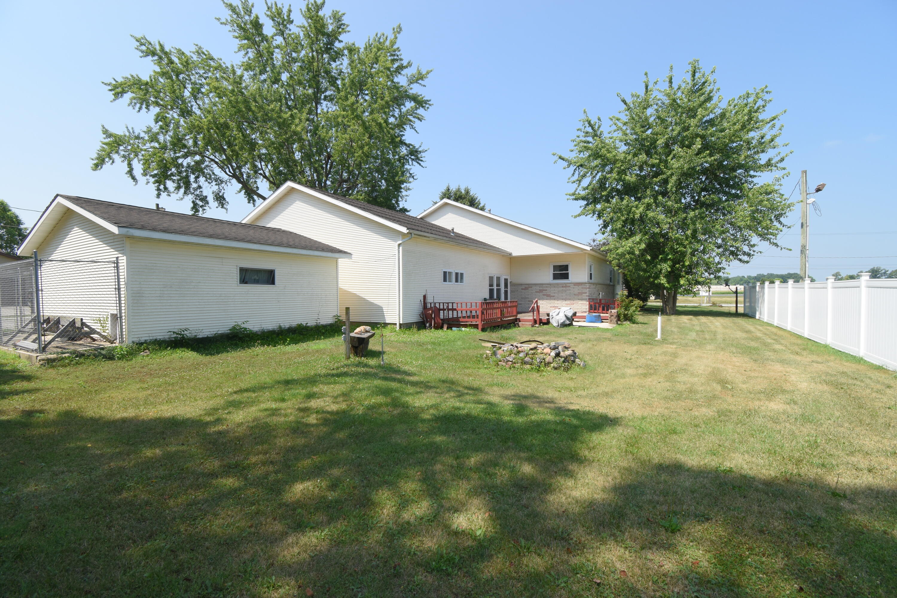719 North Monroe Street Rensselaer, IN 47978 - Photo 7 of 41 a house view with a garden space