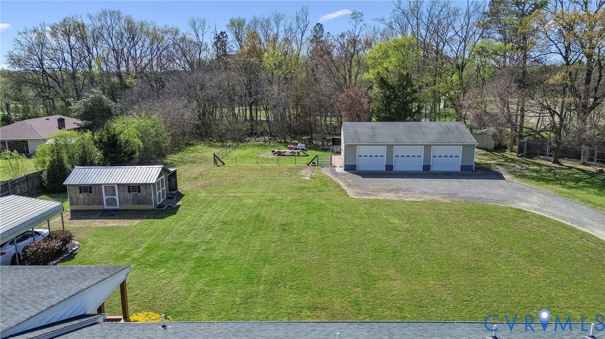 3411 Spring Run Road Mechanicsville, VA 23111 - Photo 37 of 41 a view of backyard with seating area and trees