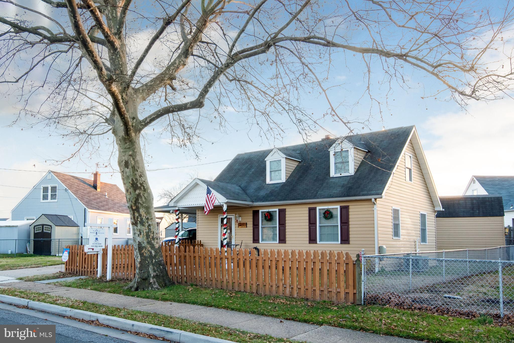 8217 Northview Road Baltimore, MD 21222 - Photo 1 of 21 a front view of house with yard and green space