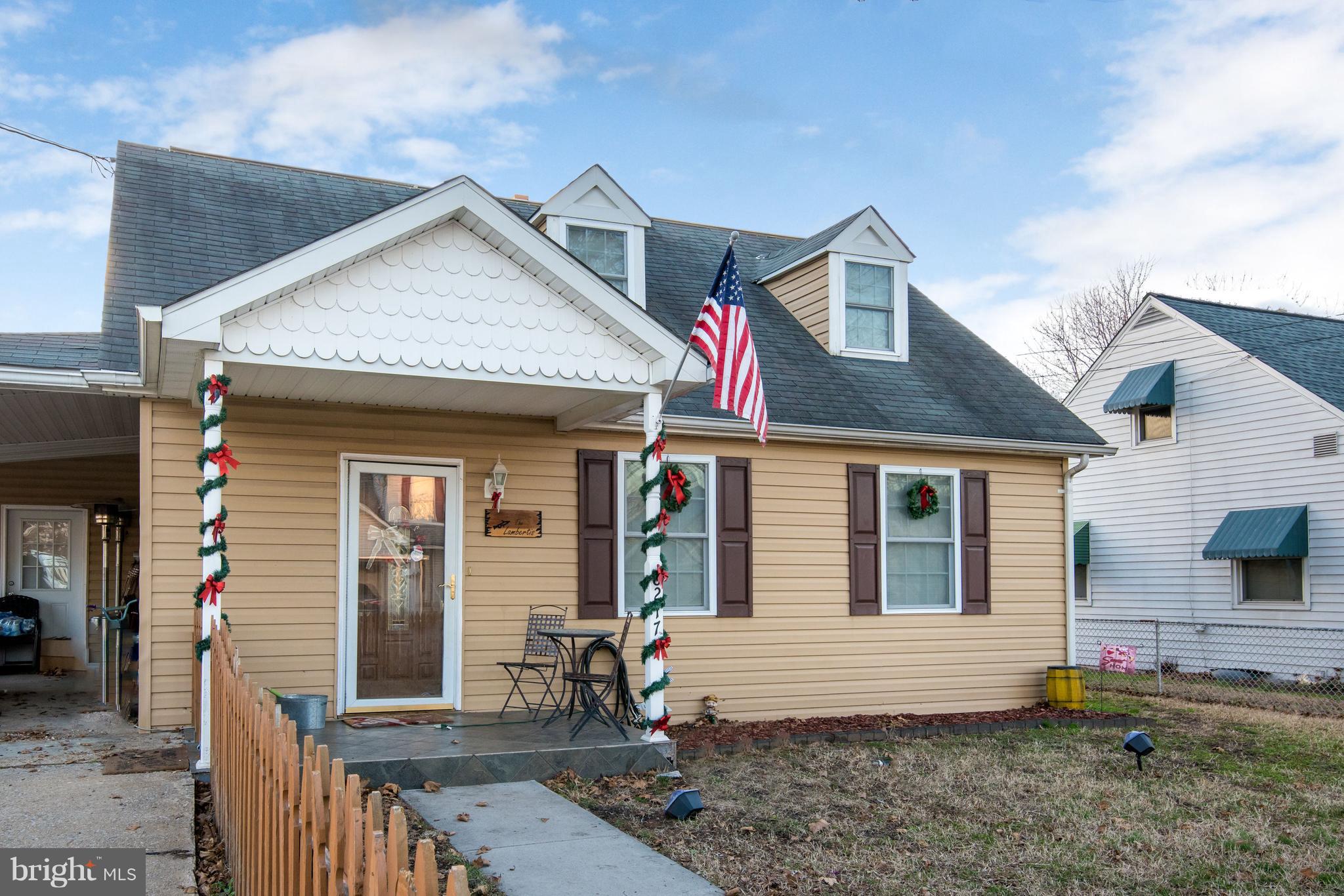 8217 Northview Road Baltimore, MD 21222 - Photo 3 of 21 a front view of a house with garden