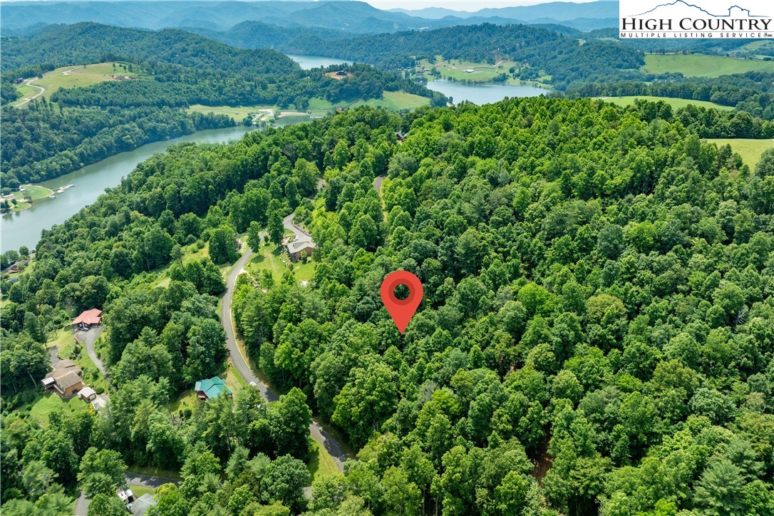 Lot 13 Lake Ridge Butler, TN 37640 - Photo 7 of 25 an aerial view of a houses with a lush green hillside