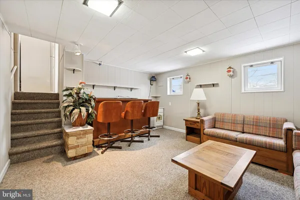 a view of a livingroom with furniture and a couch