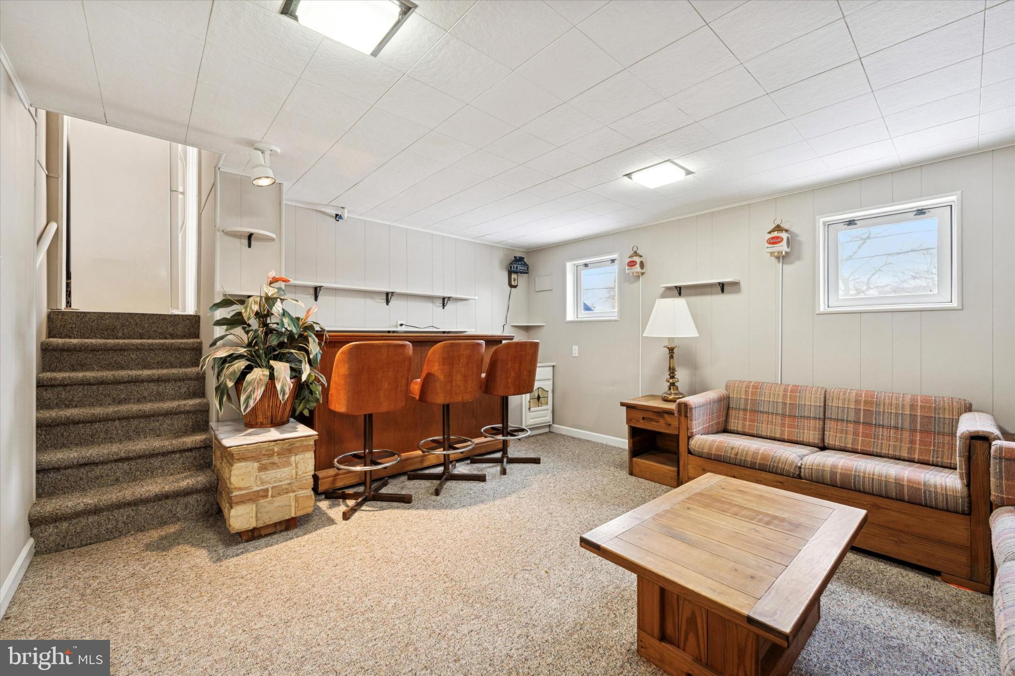 8711 Old Line Road Philadelphia, PA 19128 - Photo 20 of 25 Cozy basement retreat with bar seating.