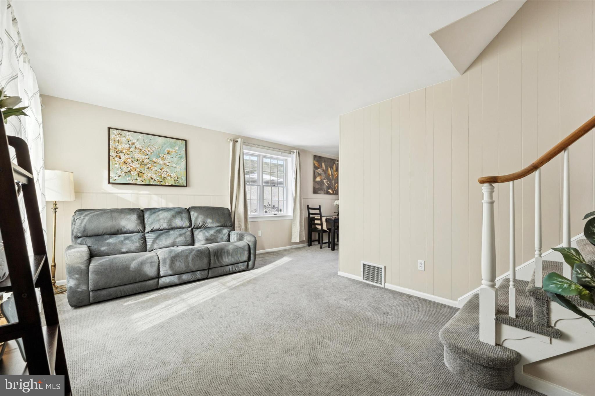 8711 Old Line Road Philadelphia, PA 19128 - Photo 2 of 21 a view of a livingroom with furniture and a window
