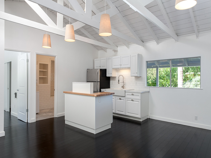 524 Barker Pass Road Montecito, CA 93108 - Photo 19 of 19 a kitchen with stove cabinets and wooden floor