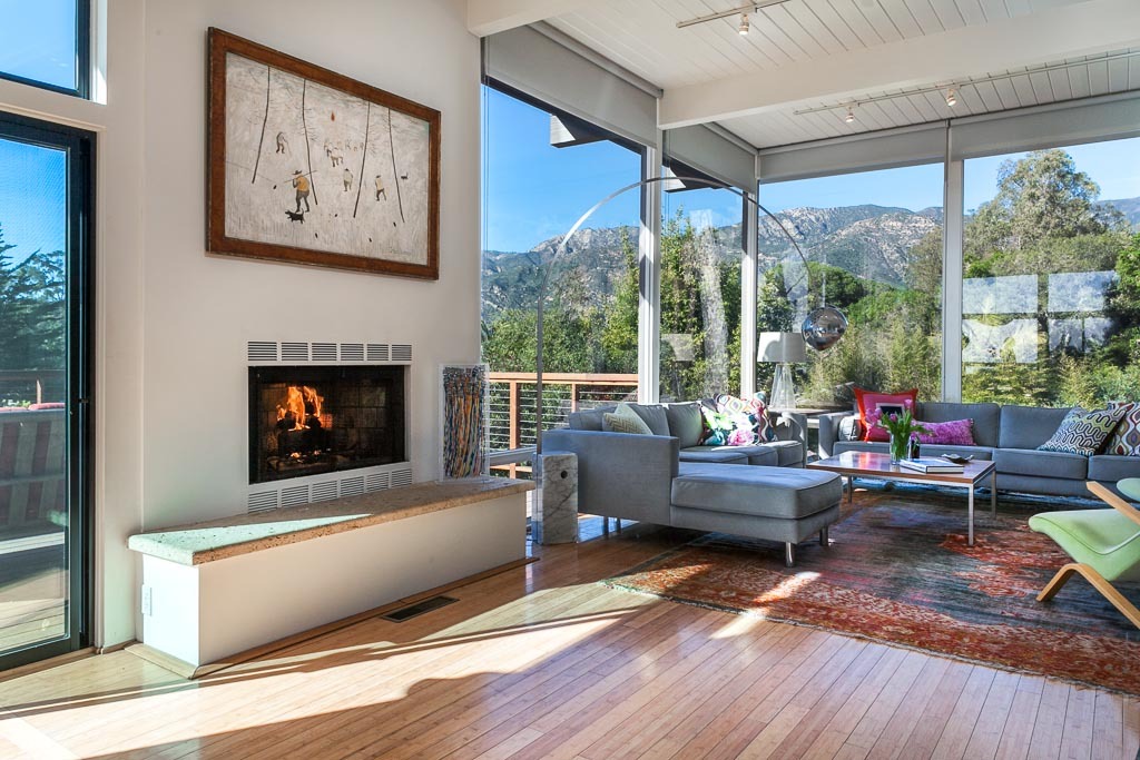 524 Barker Pass Road Montecito, CA 93108 - Photo 5 of 19 a living room with furniture large window and a fireplace