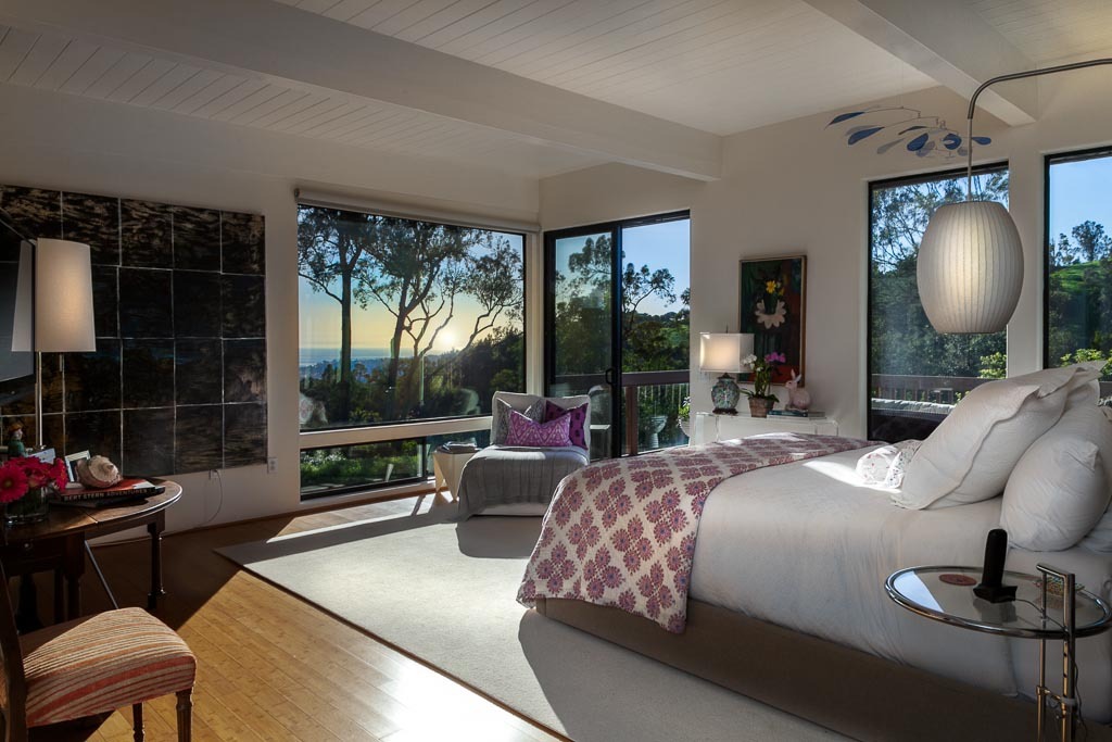 524 Barker Pass Road Montecito, CA 93108 - Photo 7 of 19 a bedroom with bed or couch and a large window