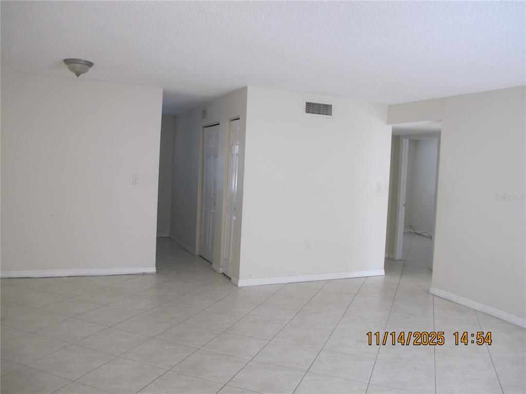 12405 Orange Blossom Oak Place, Unit 201 Tampa, FL 33612 - Photo 5 of 11 a view of an empty room