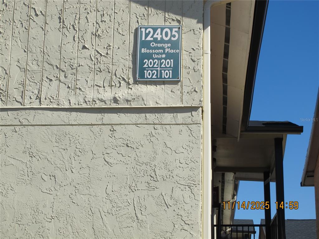 12405 Orange Blossom Oak Place, Unit 201 Tampa, FL 33612 - Photo 10 of 11 a view of a door and an entryway