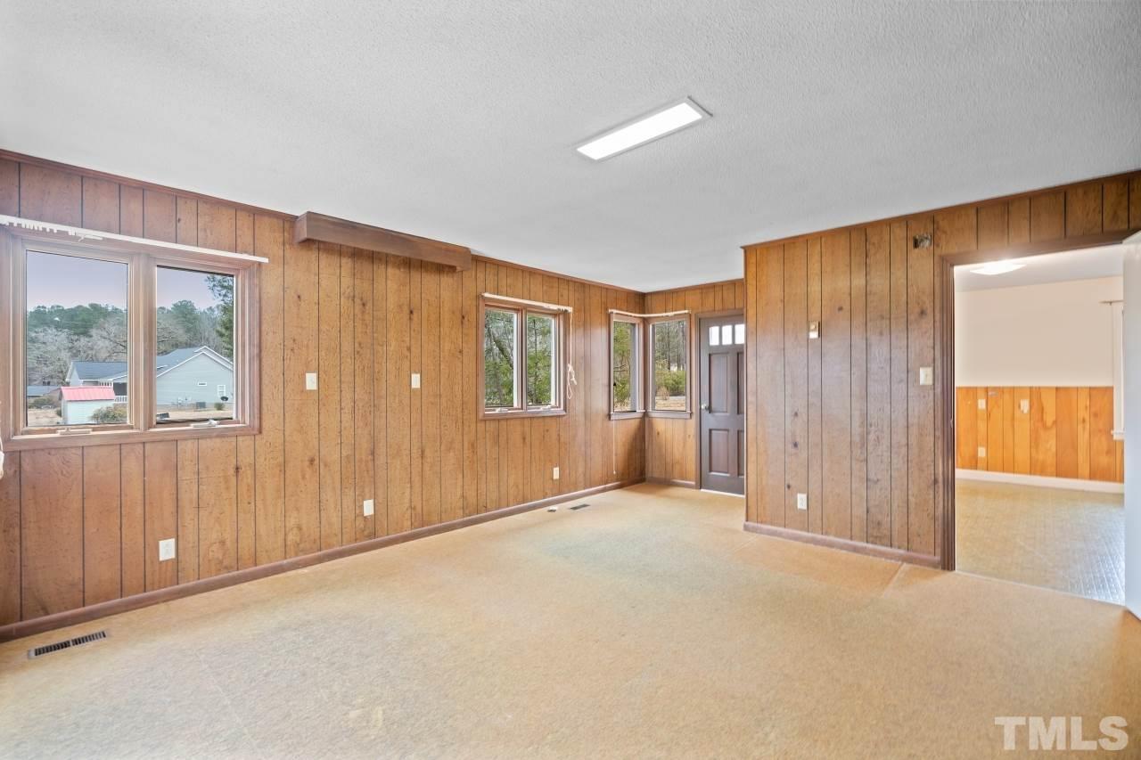 4762 Farrell Road Sanford, NC 27330 - Photo 13 of 18 an empty room with windows and closet