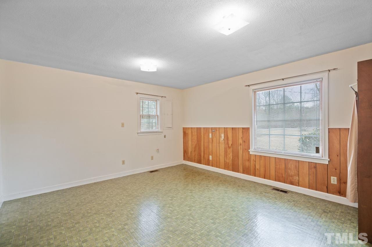 4762 Farrell Road Sanford, NC 27330 - Photo 14 of 18 an empty room with windows