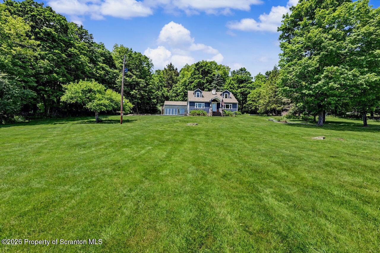 457 Craig Road Dalton, PA 18414 - Photo 113 of 114 a house view with a garden space
