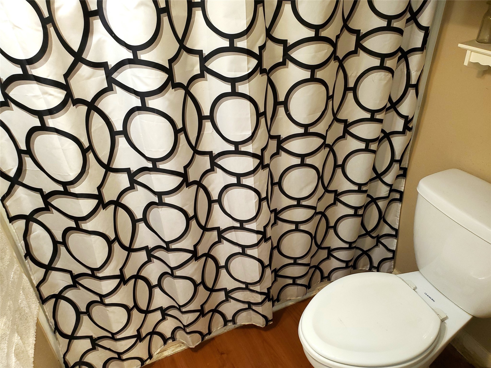 6622 Spring Haven Street San Antonio, TX 78249 - Photo 14 of 25 a bathroom with a toilet and a sink