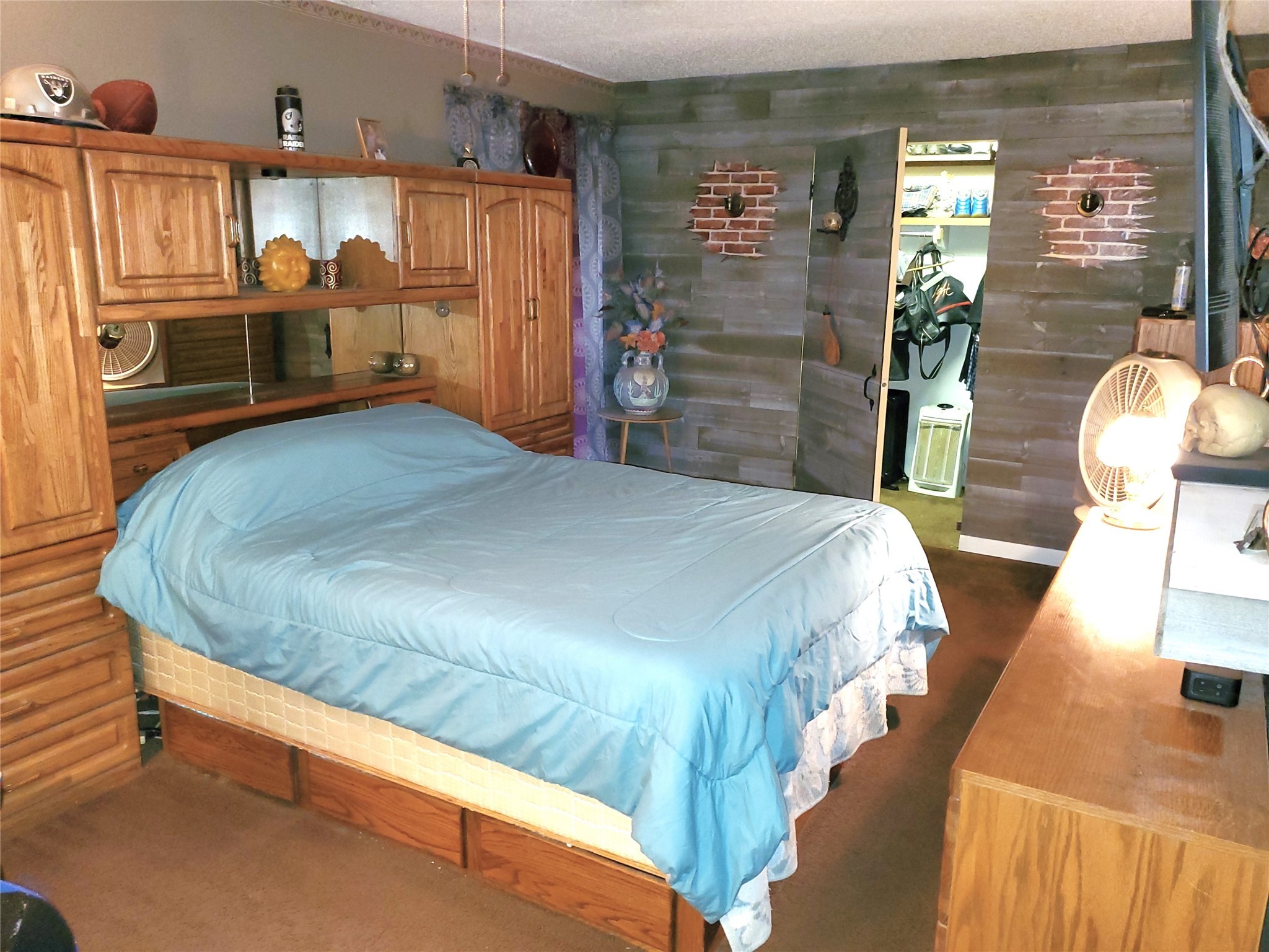 6622 Spring Haven Street San Antonio, TX 78249 - Photo 17 of 25 a bedroom with bed and wooden floor