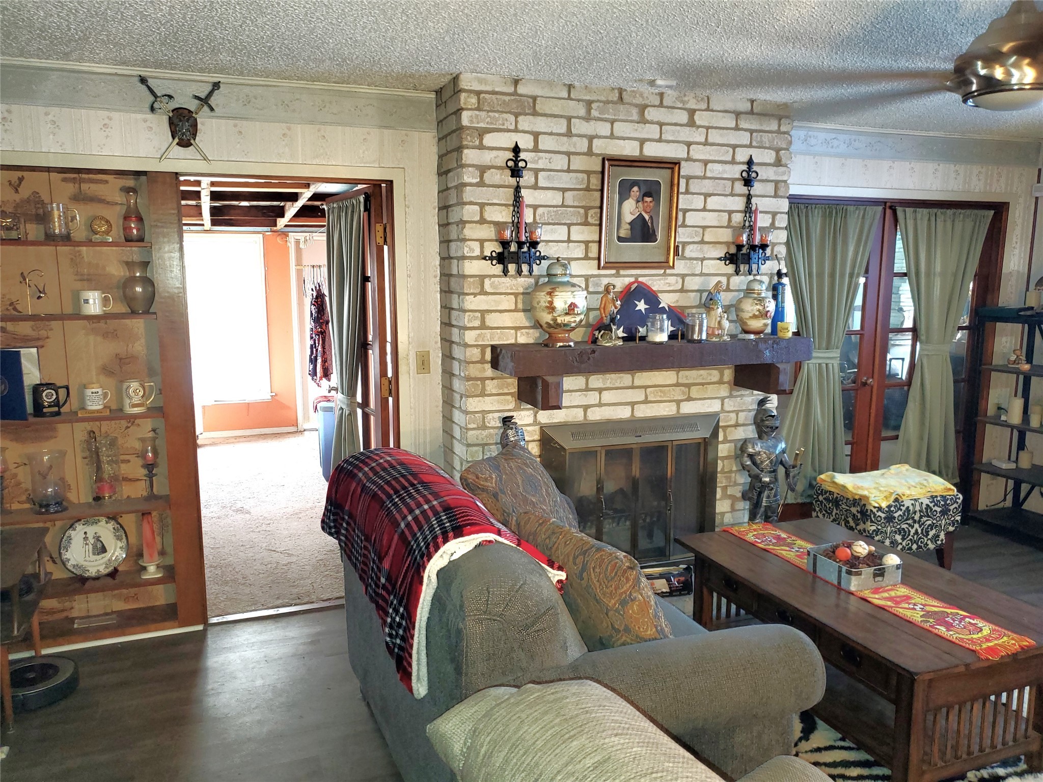 6622 Spring Haven Street San Antonio, TX 78249 - Photo 7 of 25 a living room with furniture fireplace and flat screen tv