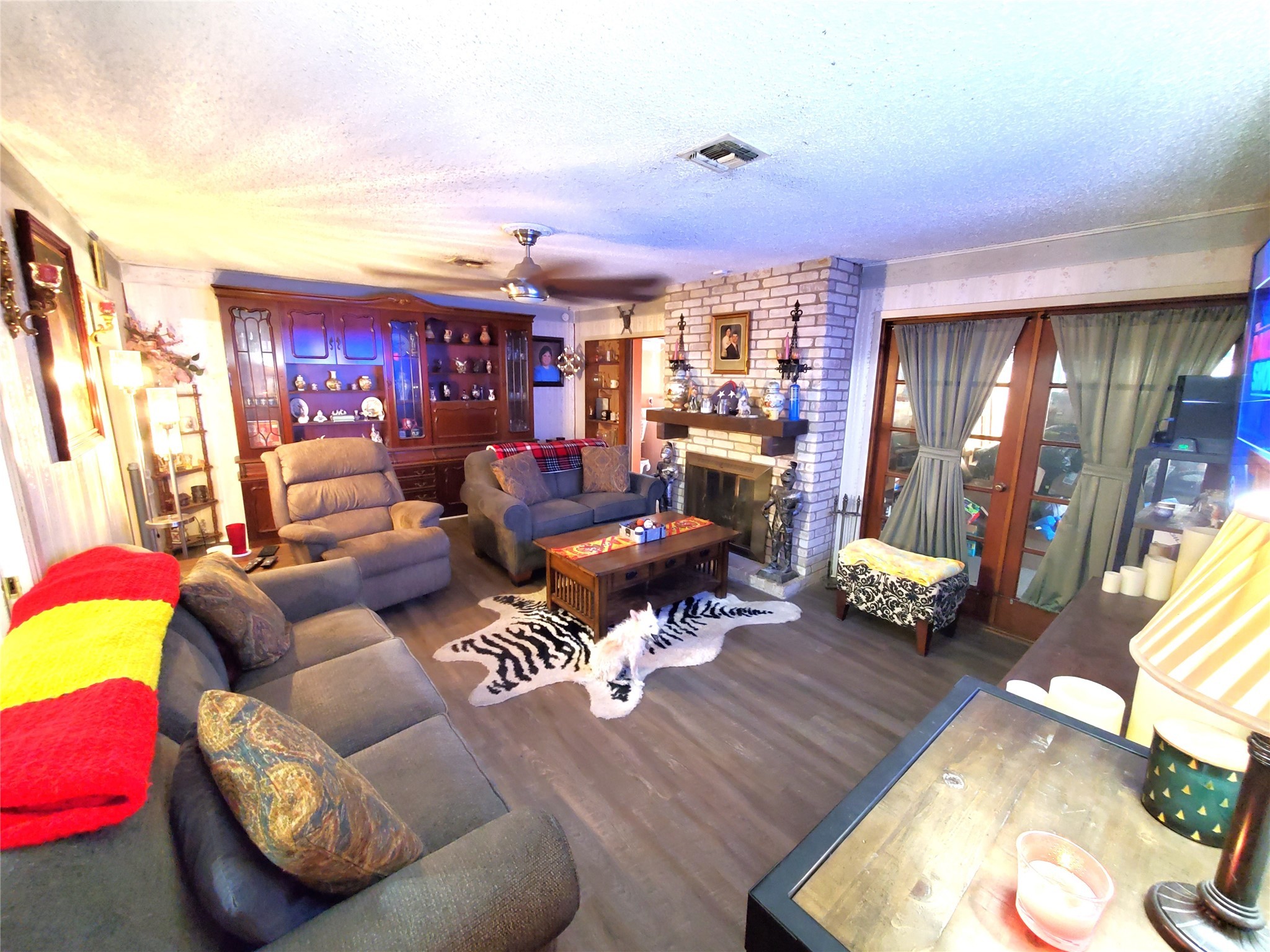 6622 Spring Haven Street San Antonio, TX 78249 - Photo 9 of 25 a living room with furniture and a wooden floor