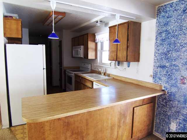 3375 Canvasback Lane Reno, NV 89508 - Photo 2 of 9 a view of a kitchen with a sink