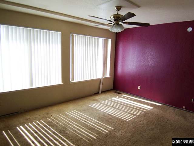 3375 Canvasback Lane Reno, NV 89508 - Photo 4 of 9 a view of an empty room with a window