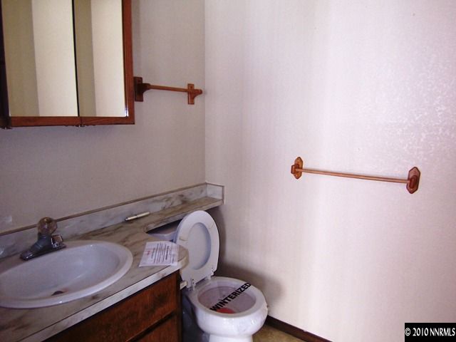 3375 Canvasback Lane Reno, NV 89508 - Photo 7 of 9 a bathroom with a sink and a toilet