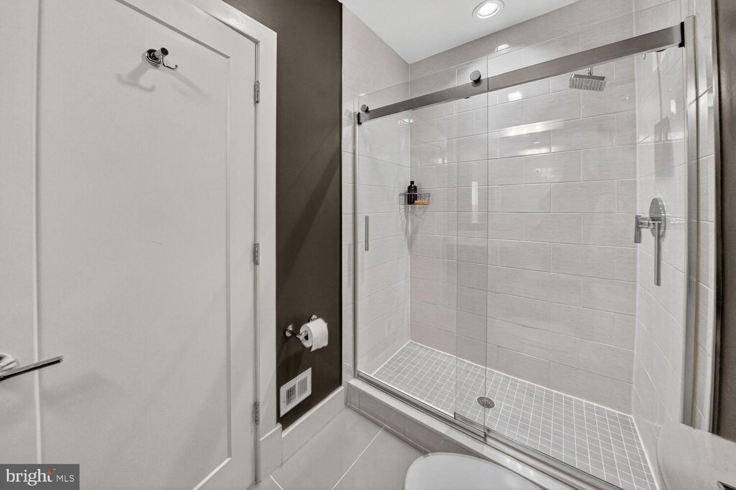 2724 12th Street Northeast, Unit 9 Washington, DC 20018 - Photo 10 of 17 Sleek Modern Bathroom with Glass Shower.