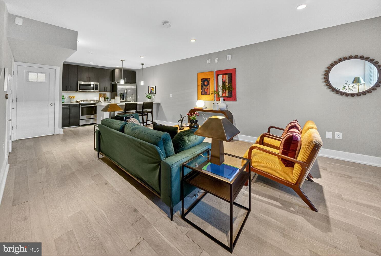 2724 12th Street Northeast, Unit 9 Washington, DC 20018 - Photo 16 of 17 Open Floor Plan- Bright Living Room / Kitchen