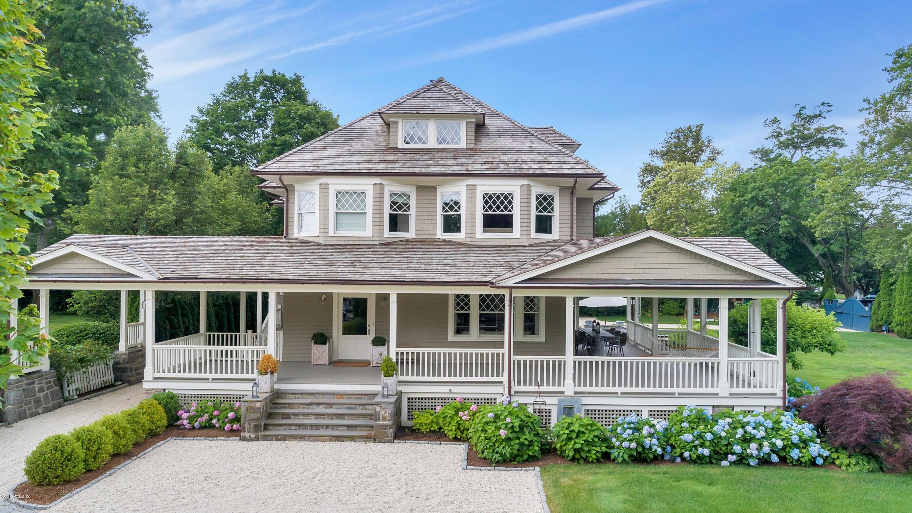 2 Keofferam Road Old Greenwich, CT 06870 - Photo 1 of 27 a front view of a house with a yard
