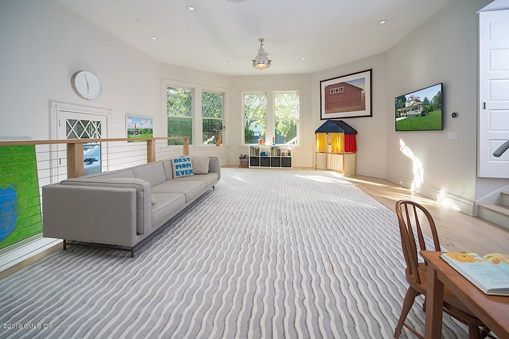 2 Keofferam Road Old Greenwich, CT 06870 - Photo 13 of 27 a bedroom with a bed couch and a window