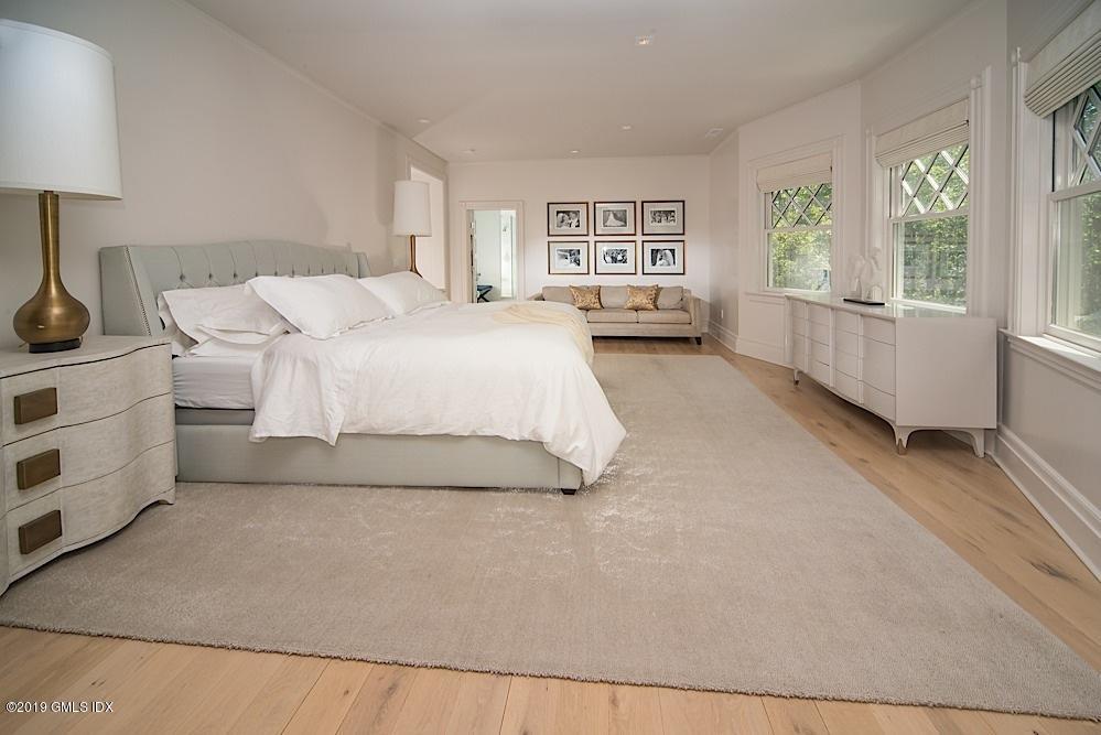 2 Keofferam Road Old Greenwich, CT 06870 - Photo 15 of 27 a large white bed in a white room