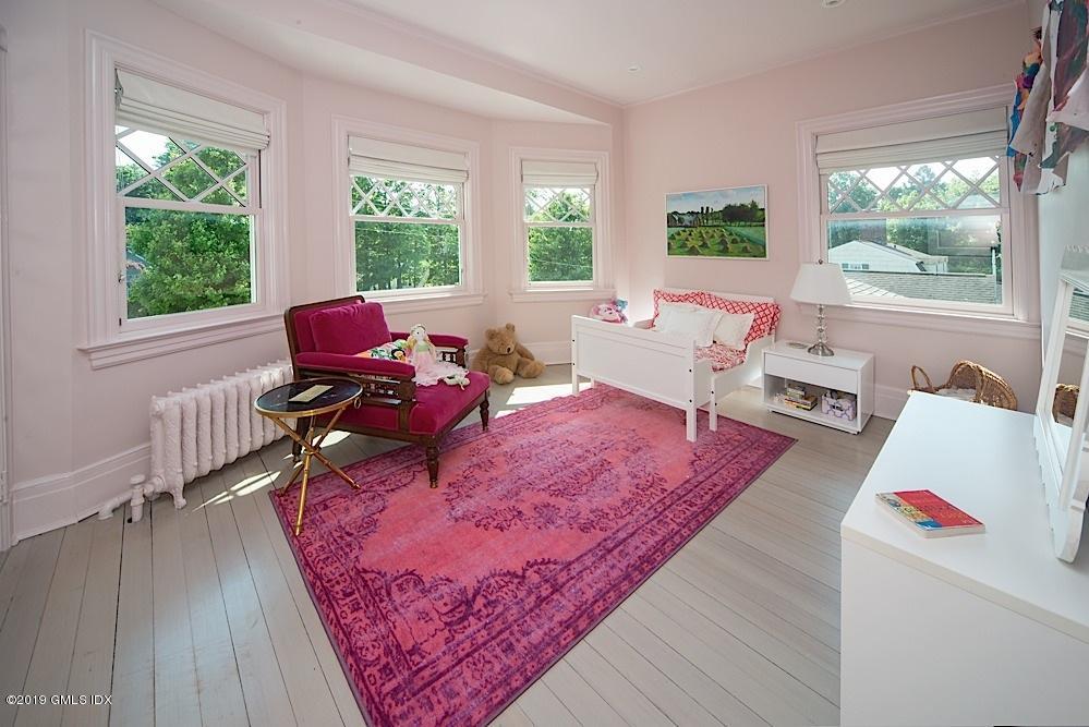 2 Keofferam Road Old Greenwich, CT 06870 - Photo 21 of 27 a living room with furniture and a large window