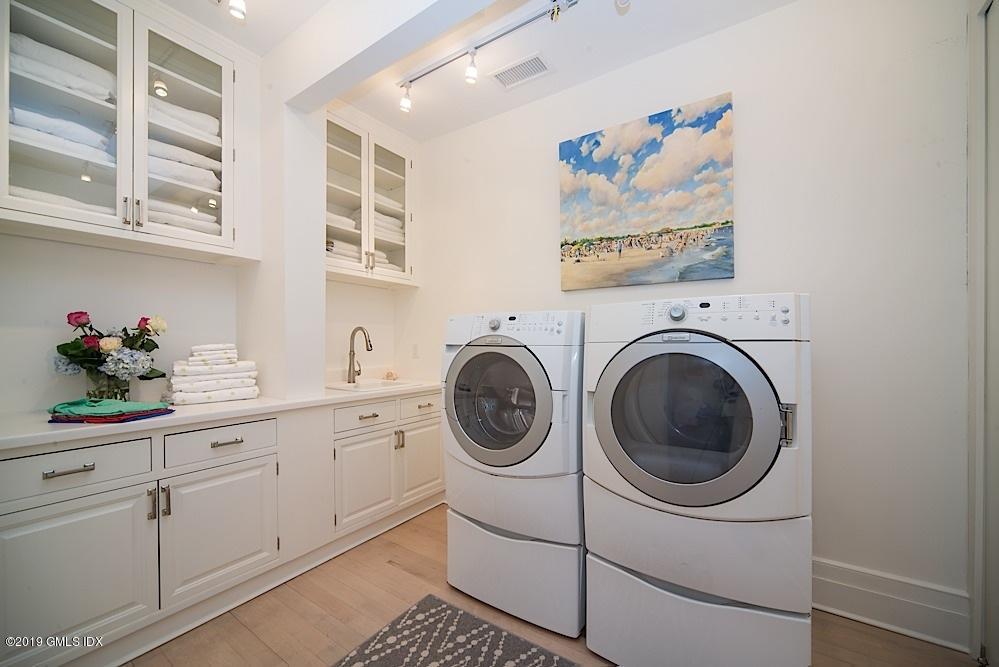 2 Keofferam Road Old Greenwich, CT 06870 - Photo 23 of 27 a utility room with sink dryer and washer