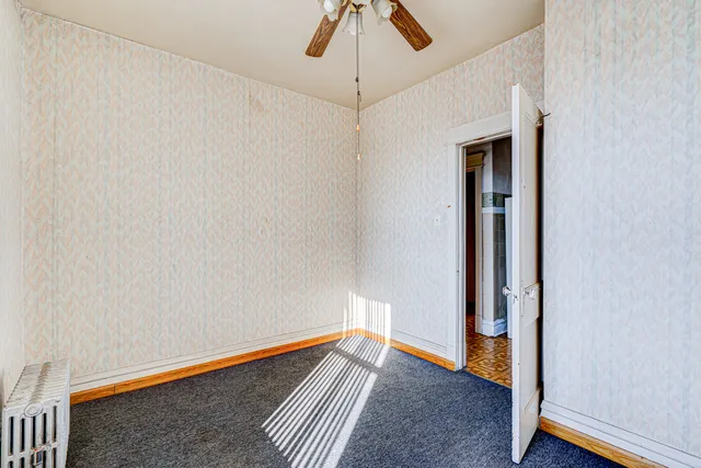 a kitchen with stainless steel appliances granite countertop a refrigerator a stove a sink and a refrigerator