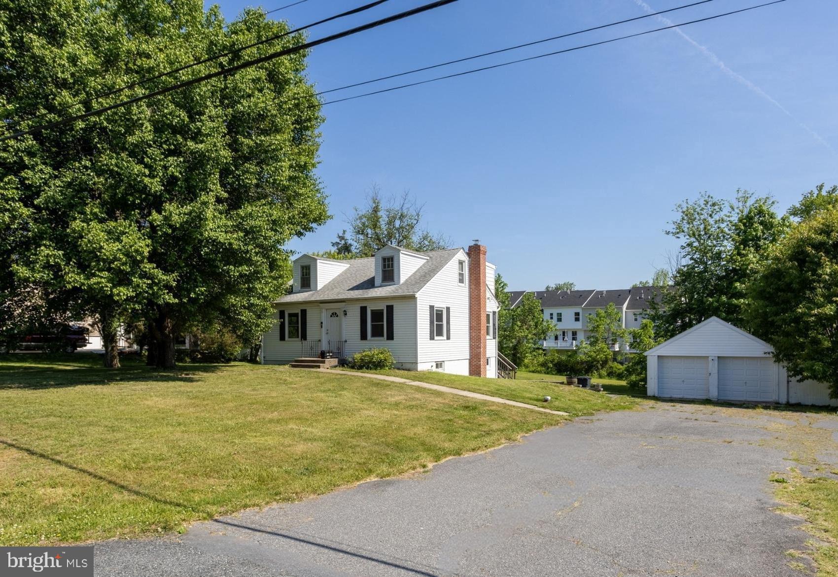 3612 Churchville Road Aberdeen, MD 21001 - Photo 1 of 49 a front view of a house with a yard and trees