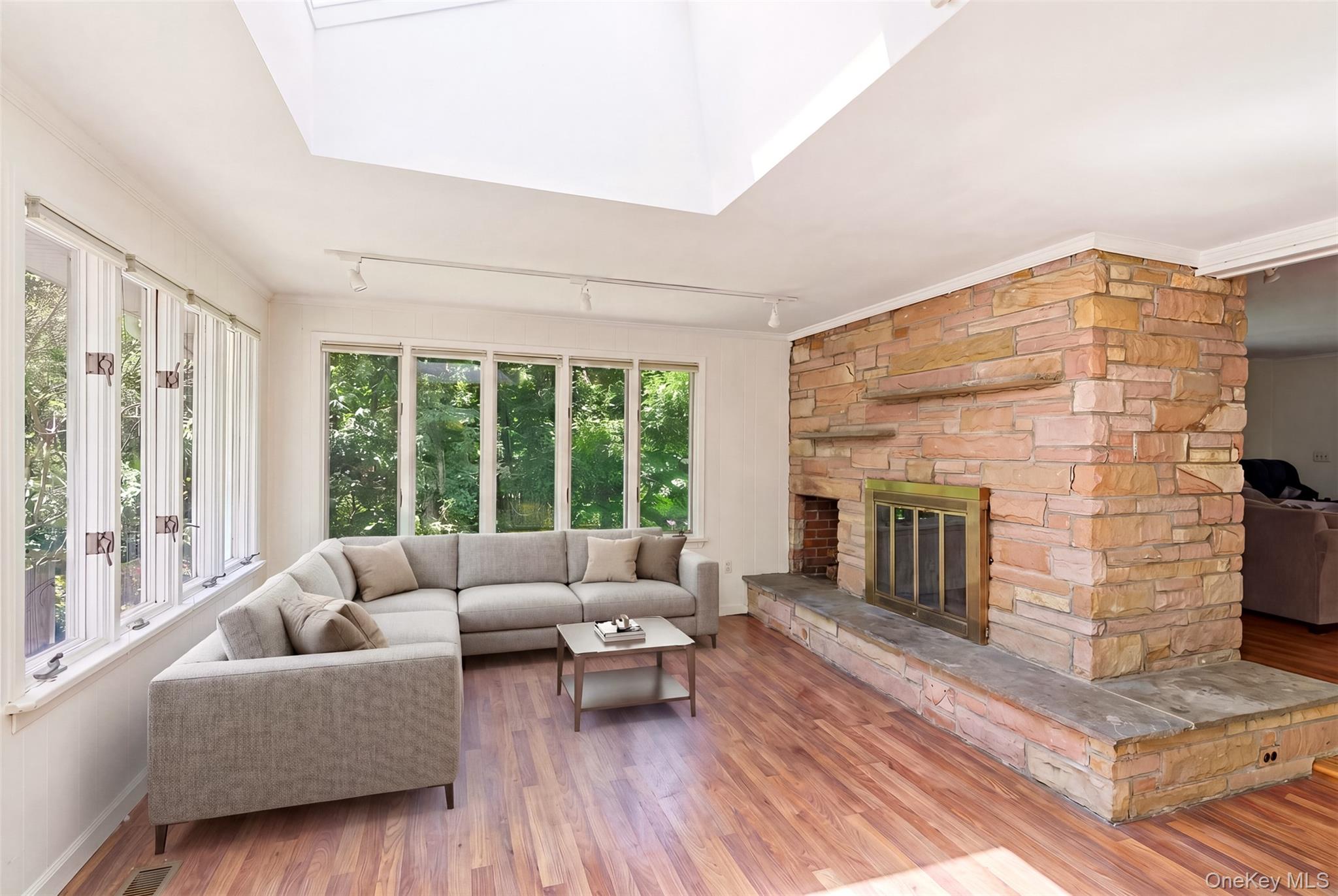 106 Vineyard Road Huntington, NY 11743 - Photo 14 of 25 a living room with furniture and a fireplace