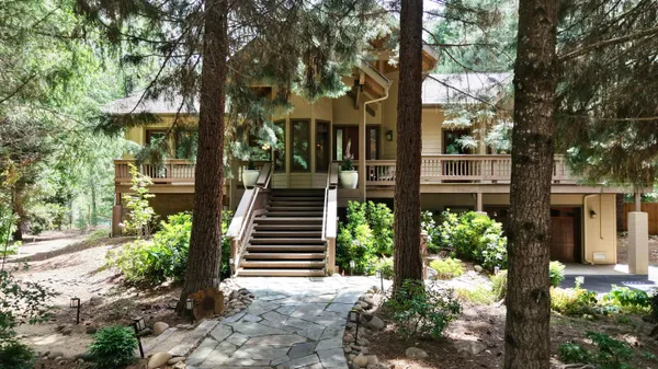 a view of house and outdoor space with swimming pool
