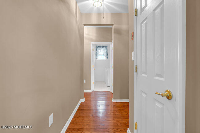 5 Banstead Way Jackson, NJ 08527 - Photo 34 of 59 a view of a hallway with wooden floor