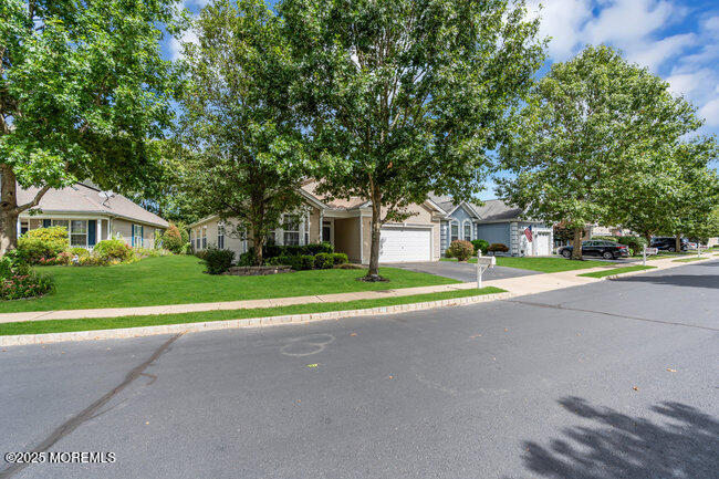 5 Banstead Way Jackson, NJ 08527 - Photo 6 of 59 a front view of house with yard and green space