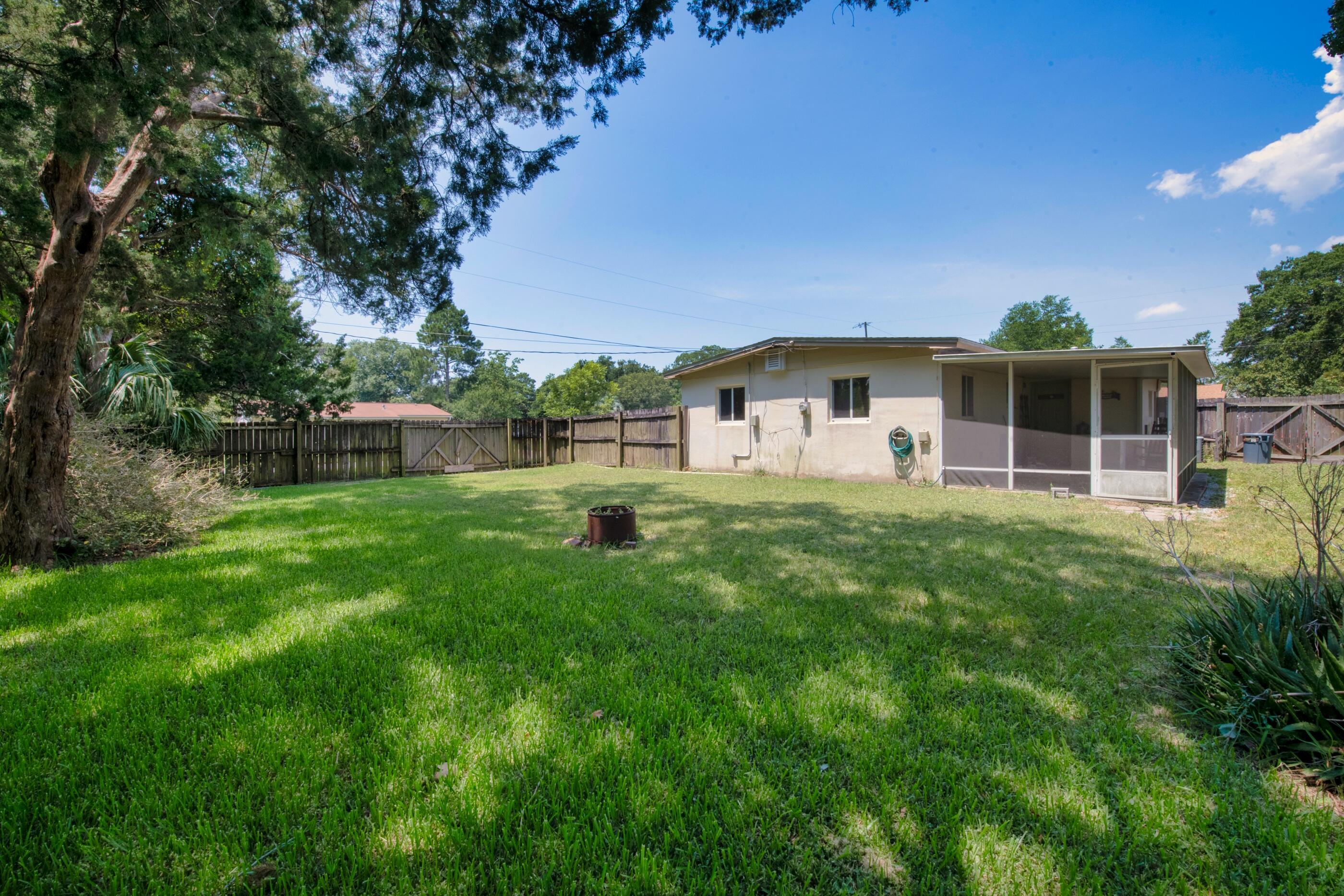 600 Shrewsbury Road Mary Esther, FL 32569 - Photo 25 of 25 a front view of house with yard and green space