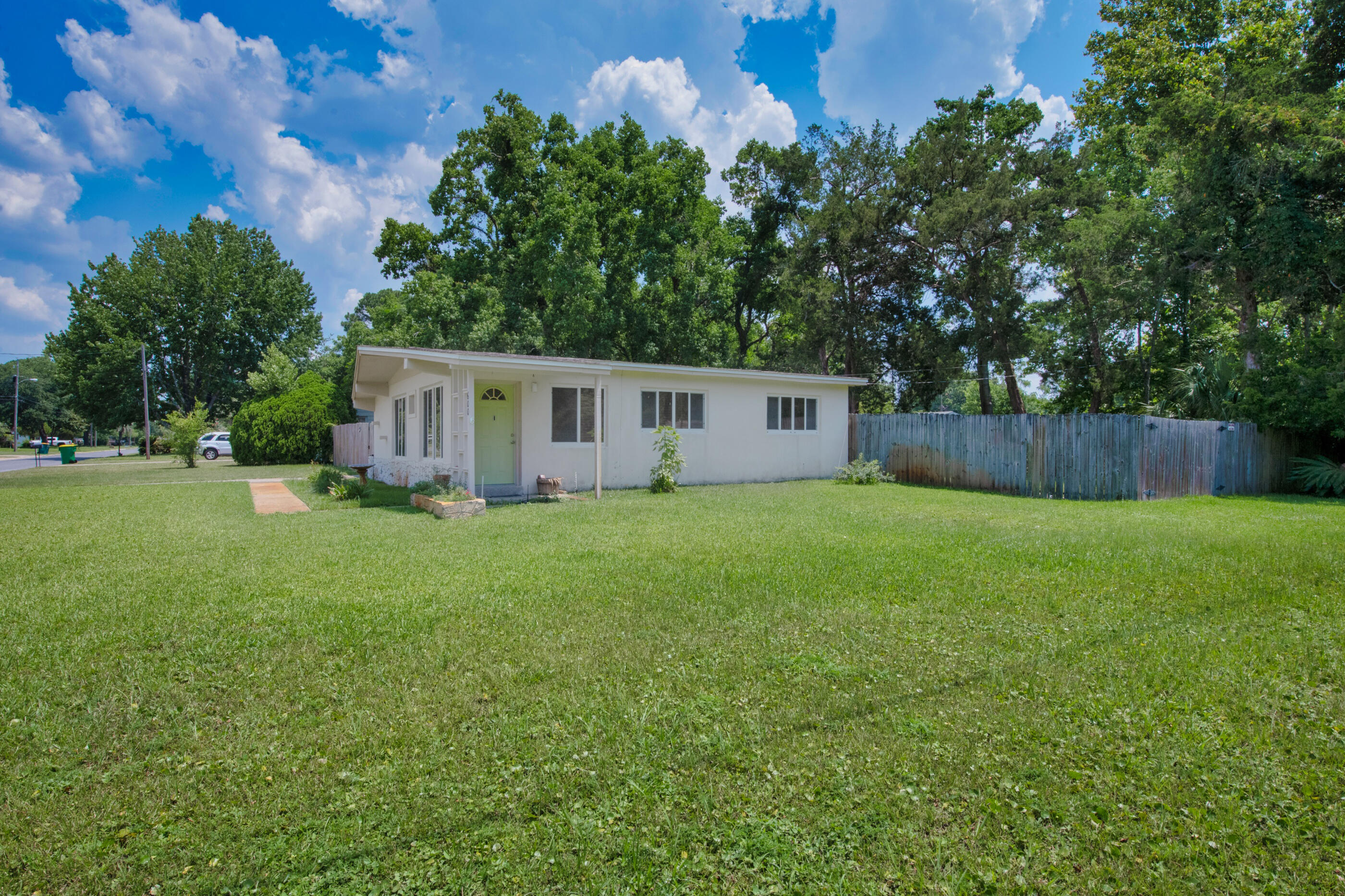 600 Shrewsbury Road Mary Esther, FL 32569 - Photo 3 of 25 a view of a house with backyard and a sitting area