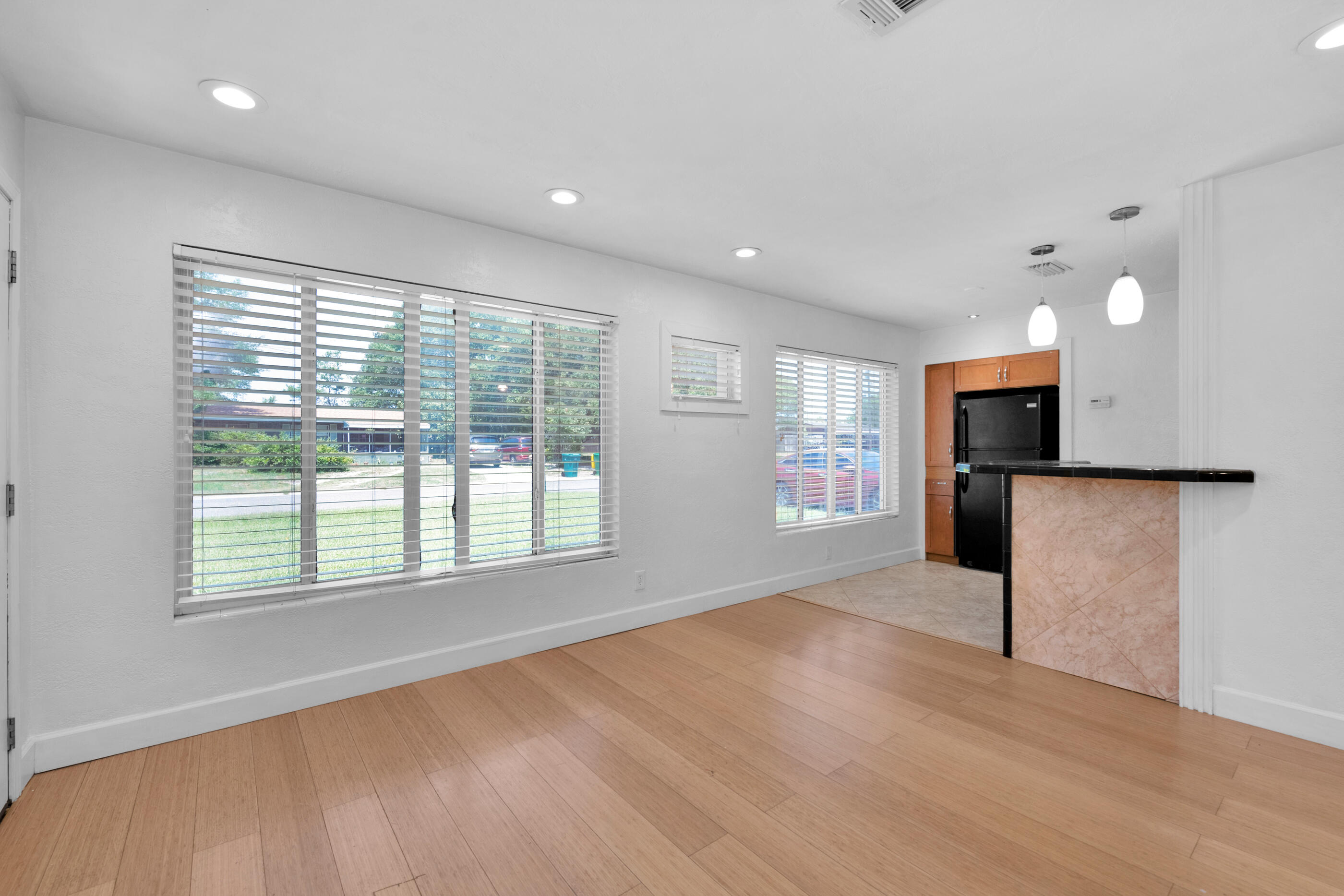 600 Shrewsbury Road Mary Esther, FL 32569 - Photo 5 of 25 a view of an empty room with a window and wooden floor