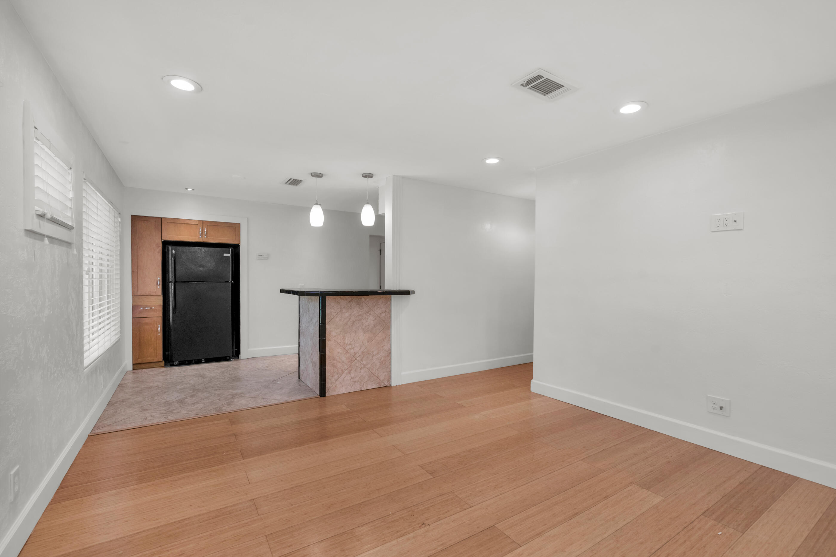 600 Shrewsbury Road Mary Esther, FL 32569 - Photo 7 of 25 a view of a kitchen with a refrigerator and a window